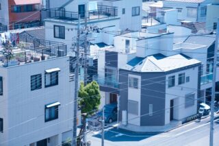 Aerial view of modern residential rooftops in Tokyo's Sumida Ward, Japan.