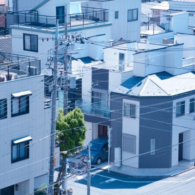 Aerial view of modern residential rooftops in Tokyo's Sumida Ward, Japan.
